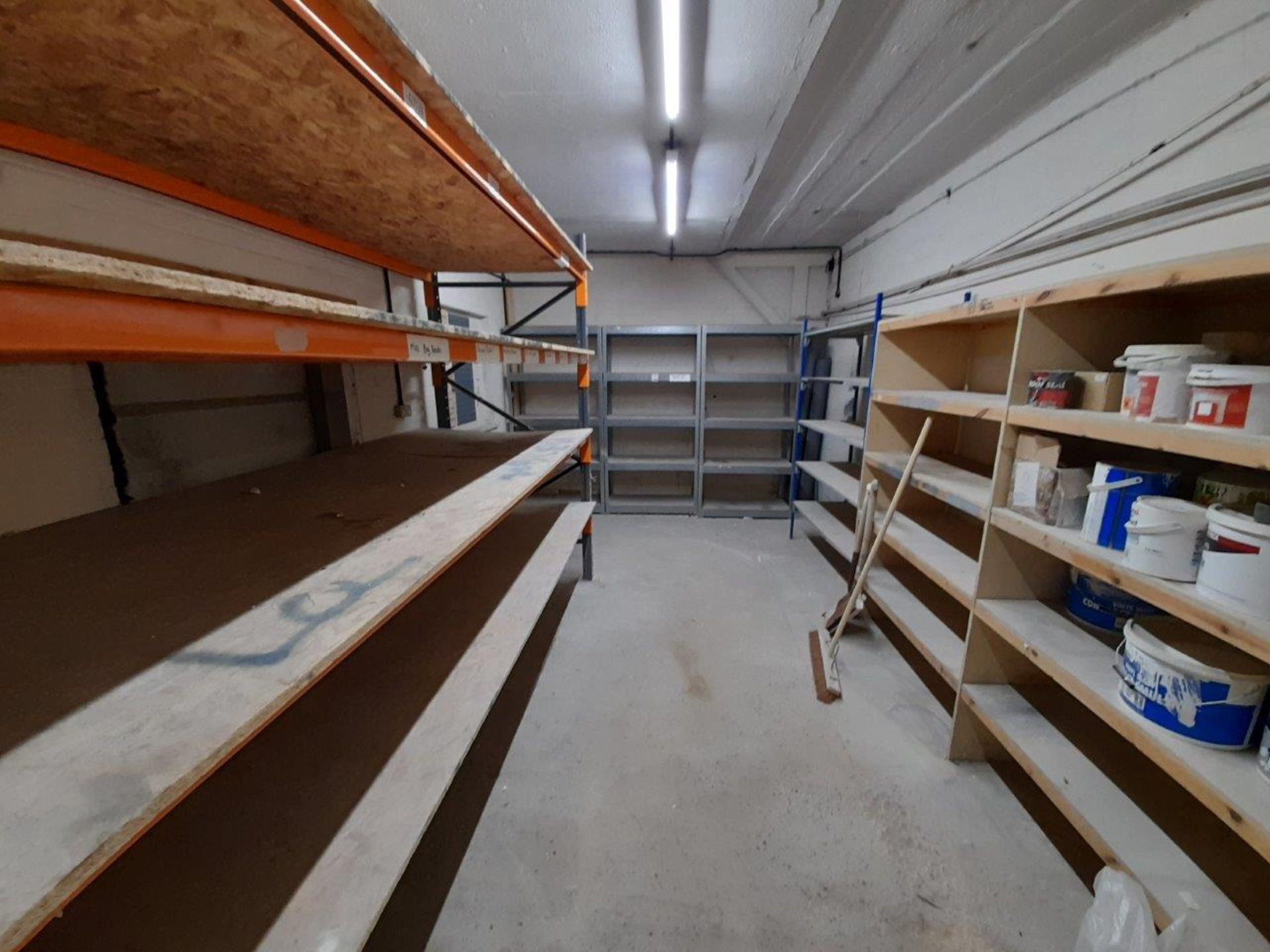 Racking and shelving to small storeroom including 1 bay of boltless pallet racking.