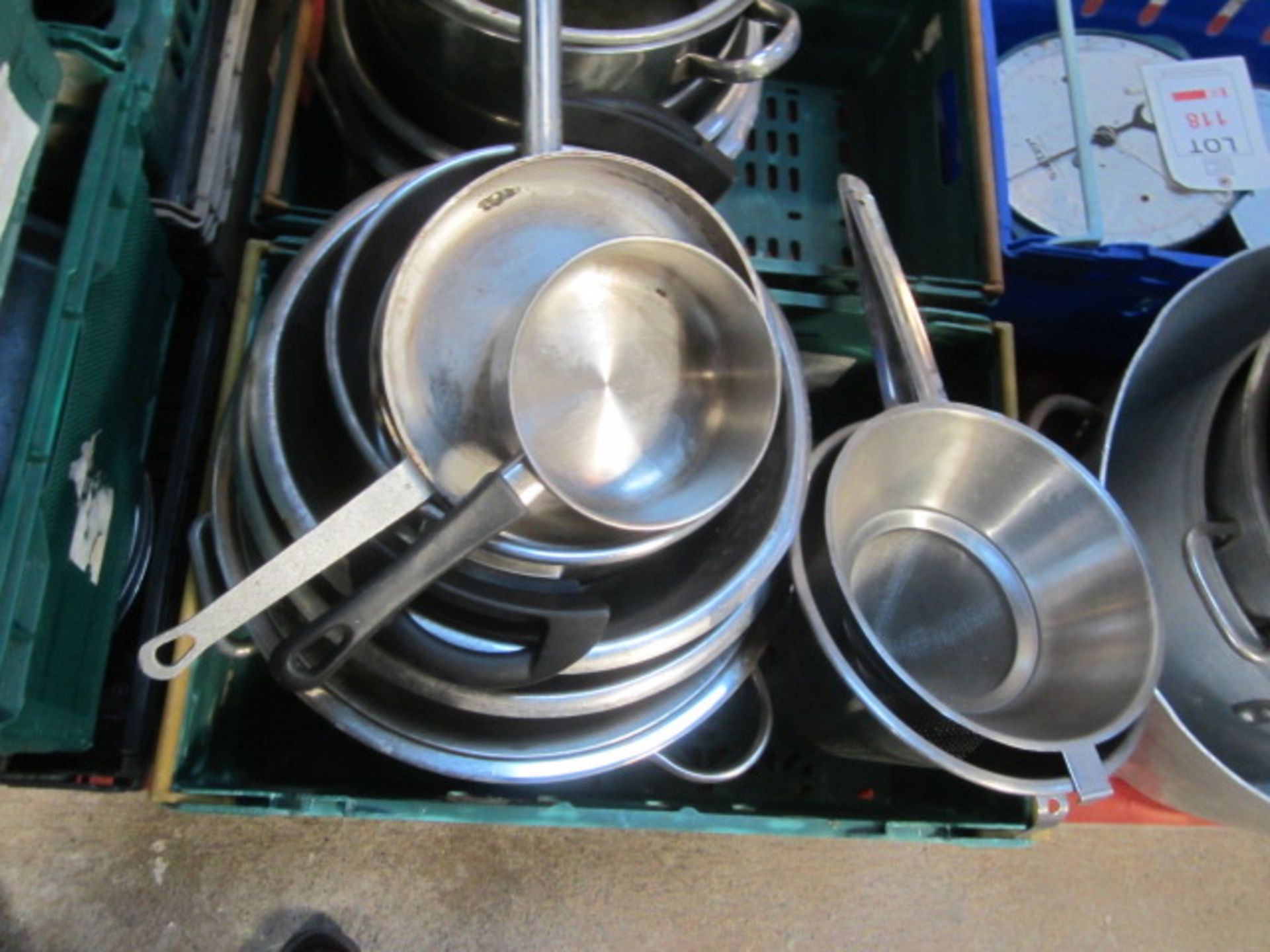 Twelve plastic crates and contents to include various pots, pans, serving trays, display baskets, - Image 8 of 10