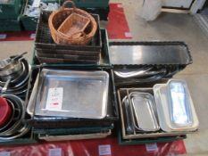 Twelve plastic crates and contents to include various pots, pans, serving trays, display baskets,