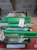 Six plastic crates and contents to include various counter display/ decorations