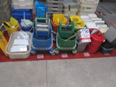 Quantity of assorted cleaning equipment, to include buckets, towel dispensers, brushes, mops,
