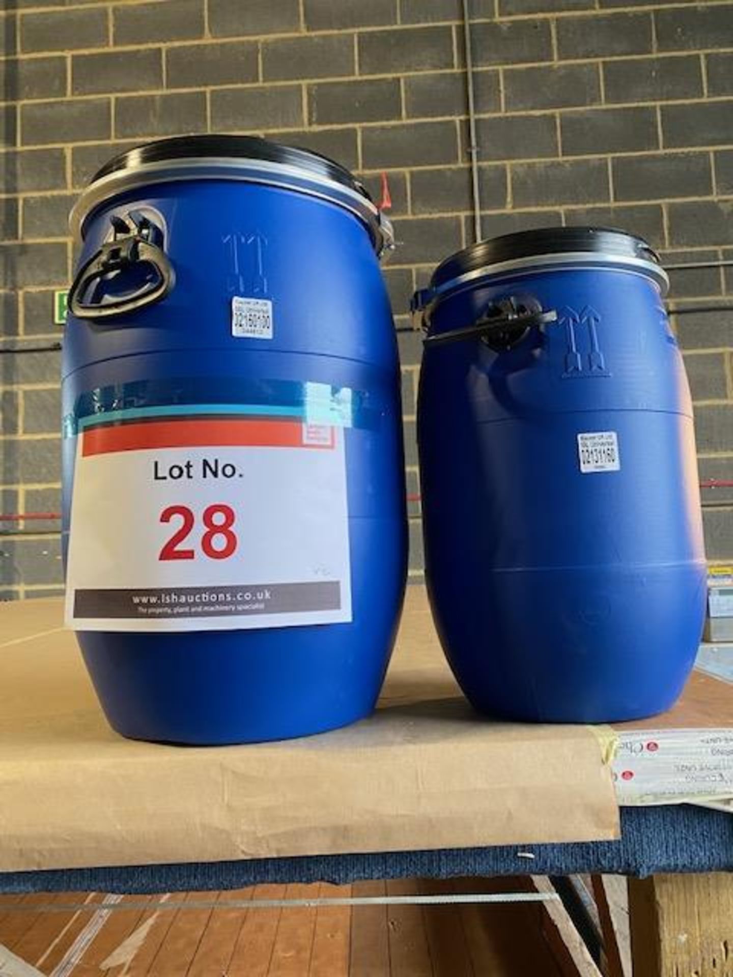 Two Mauser Liquid drums c/w tops one unused 60L one used 30L