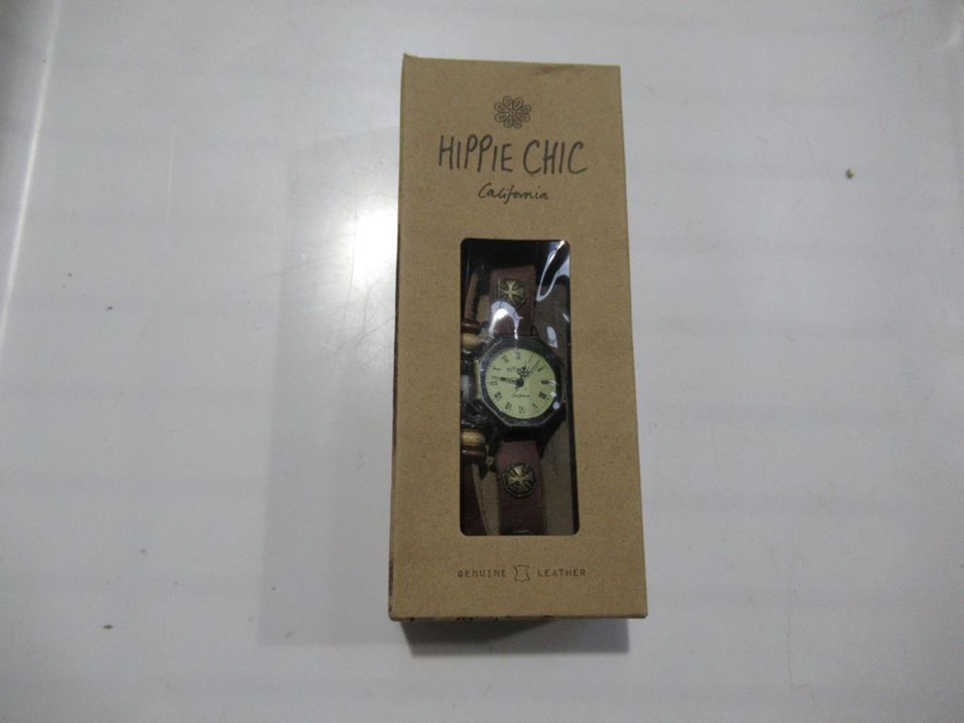 A box of Hippie Chic 'Indie Watch Tan' watches