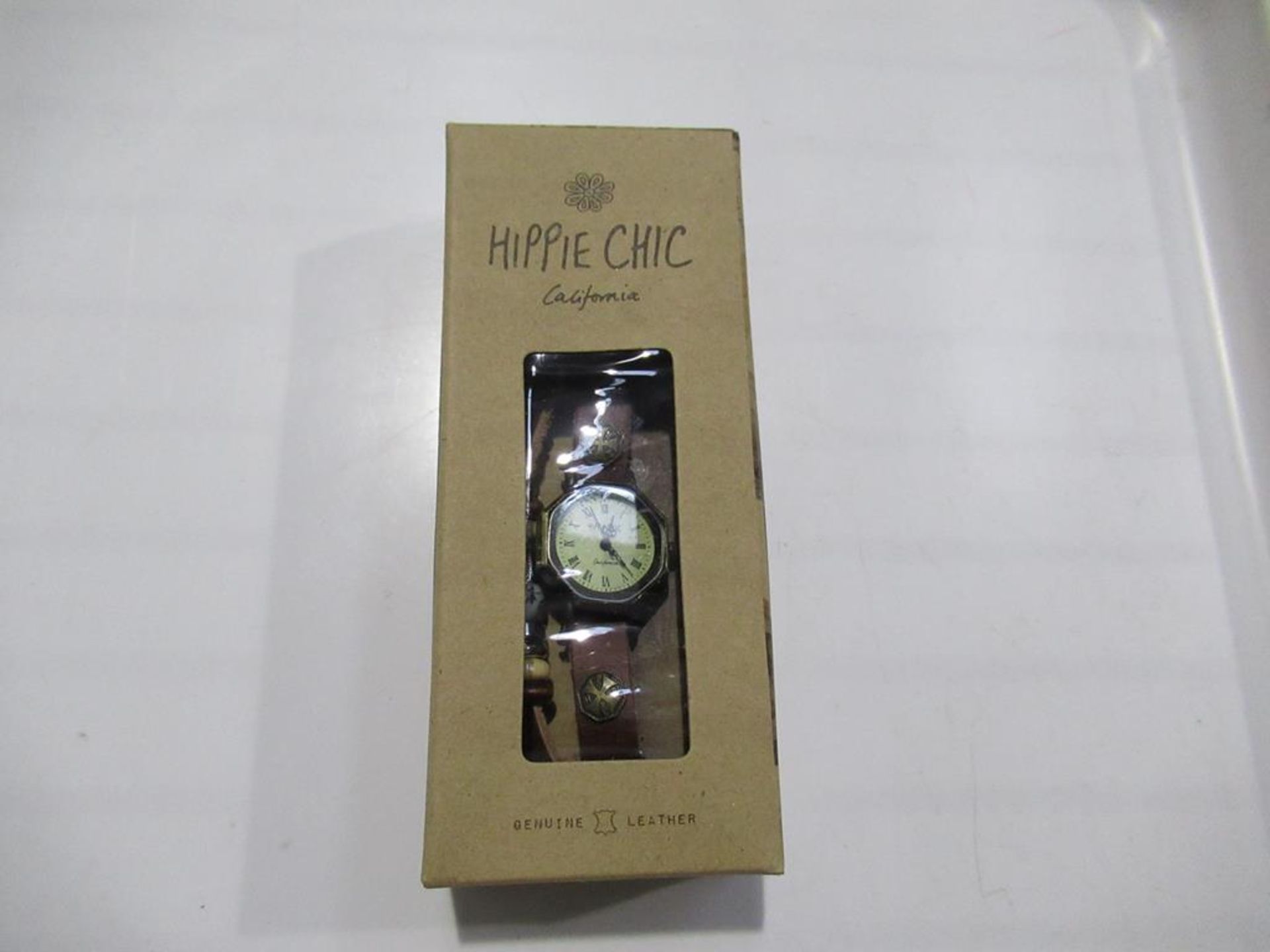 A box of Hippie Chic 'Indie Watch Tan' watches