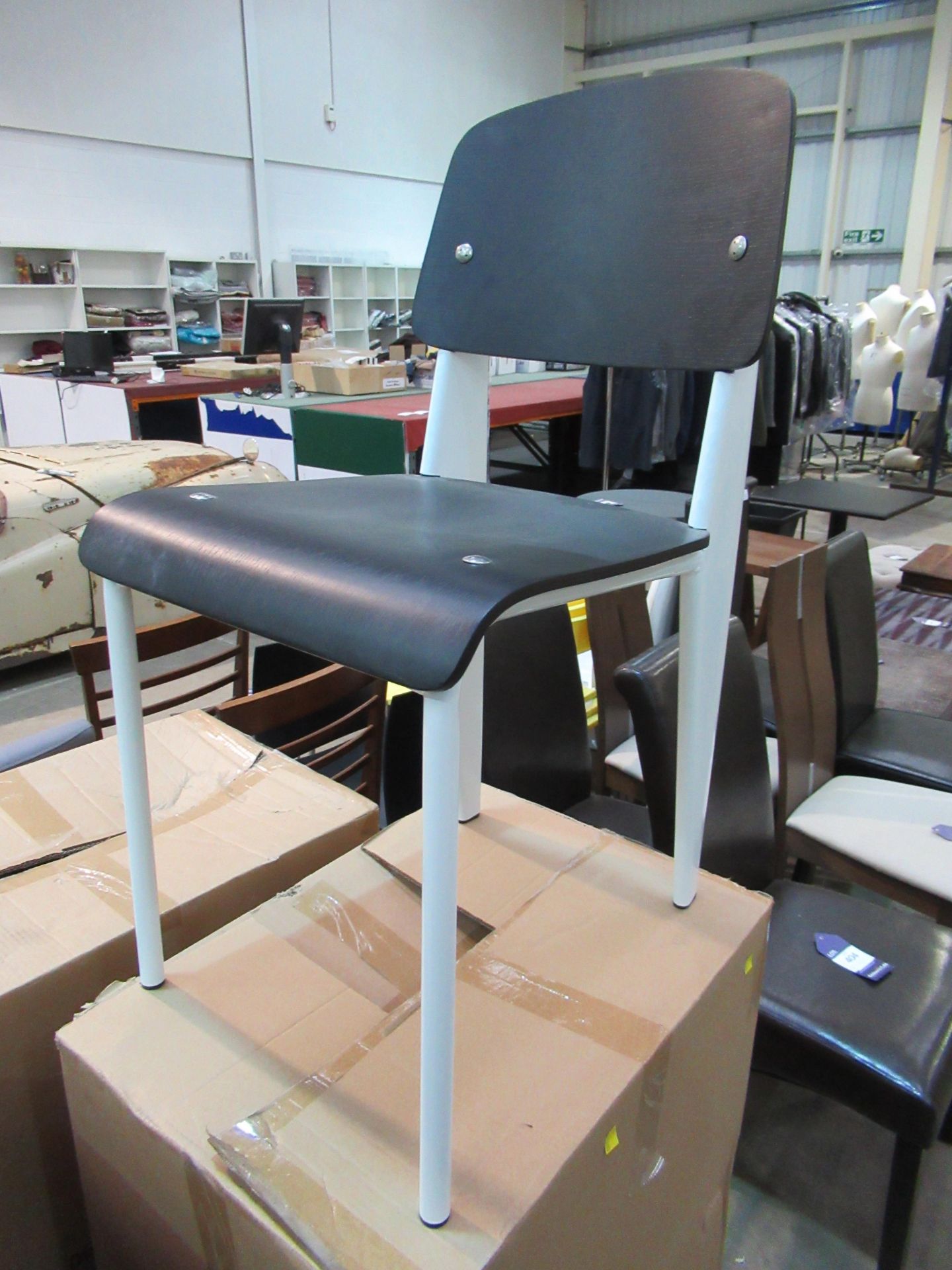 2 x boxes of 'white frame and black seat and back' chairs