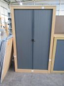 Tall tambour door cabinet
