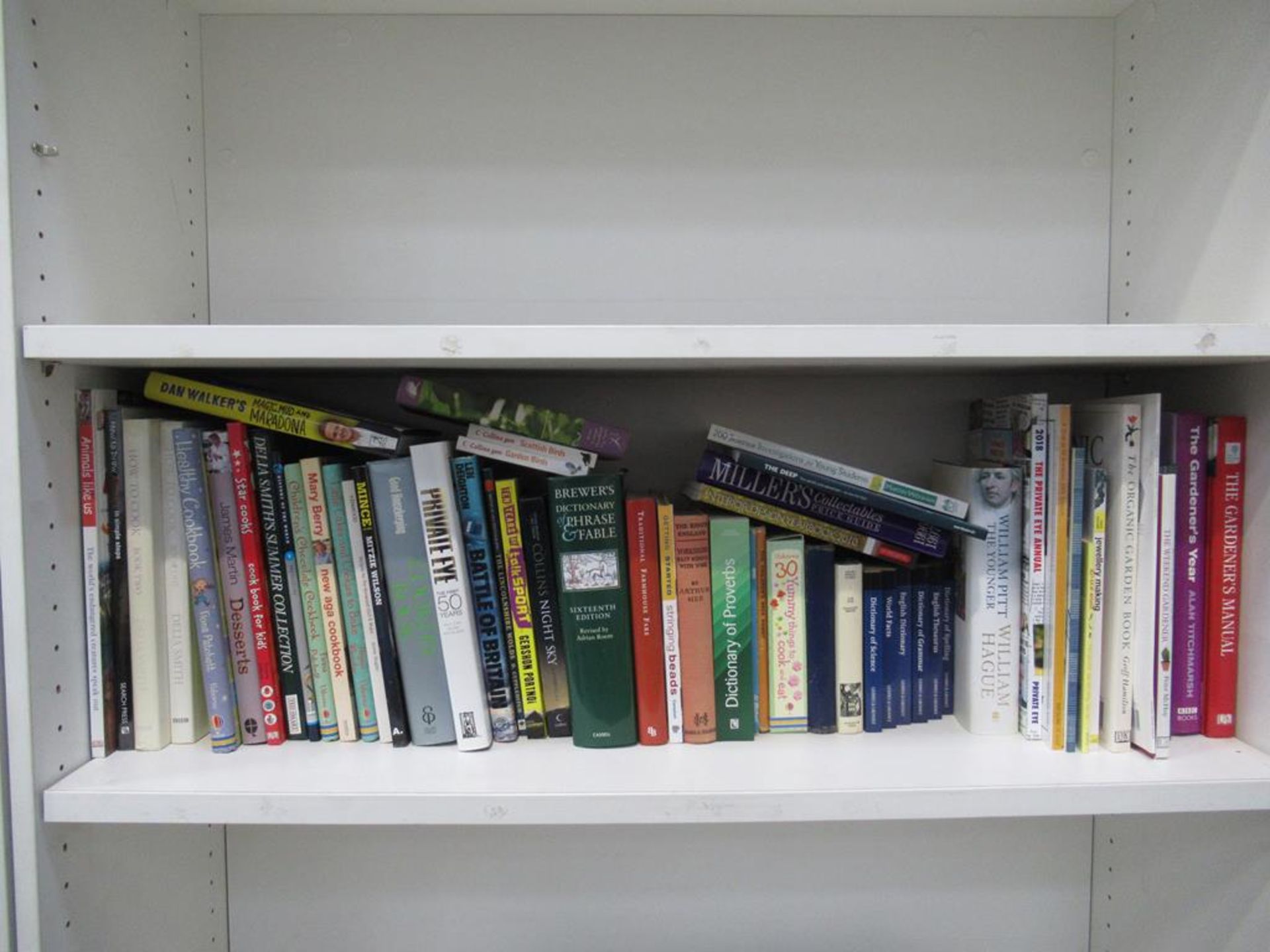 Shelf of books, including a photographic atlas of England