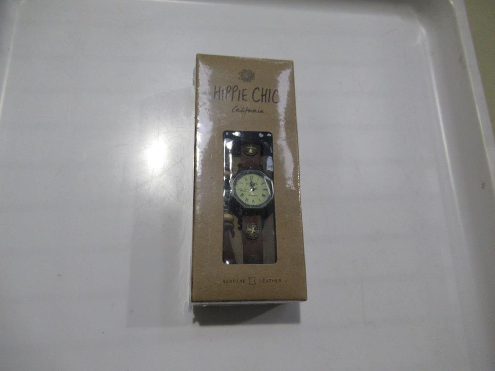 A box of Hippie Chic 'Indie Watch Tan' watches