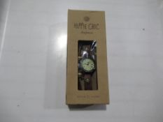 A box of Hippie Chic 'Indie Watch Tan' watches