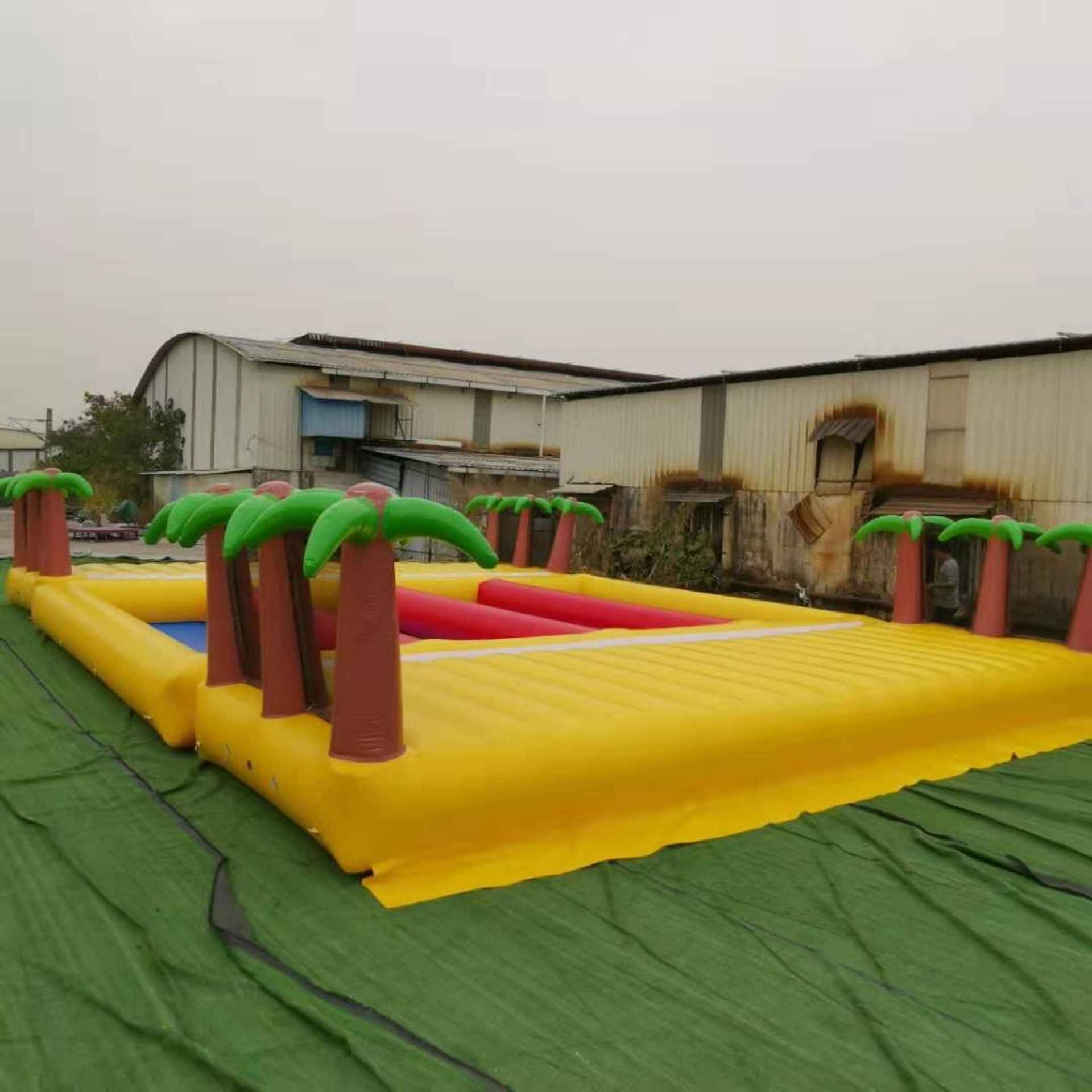 Funky Planet Inflatable Obstacle Course comprising