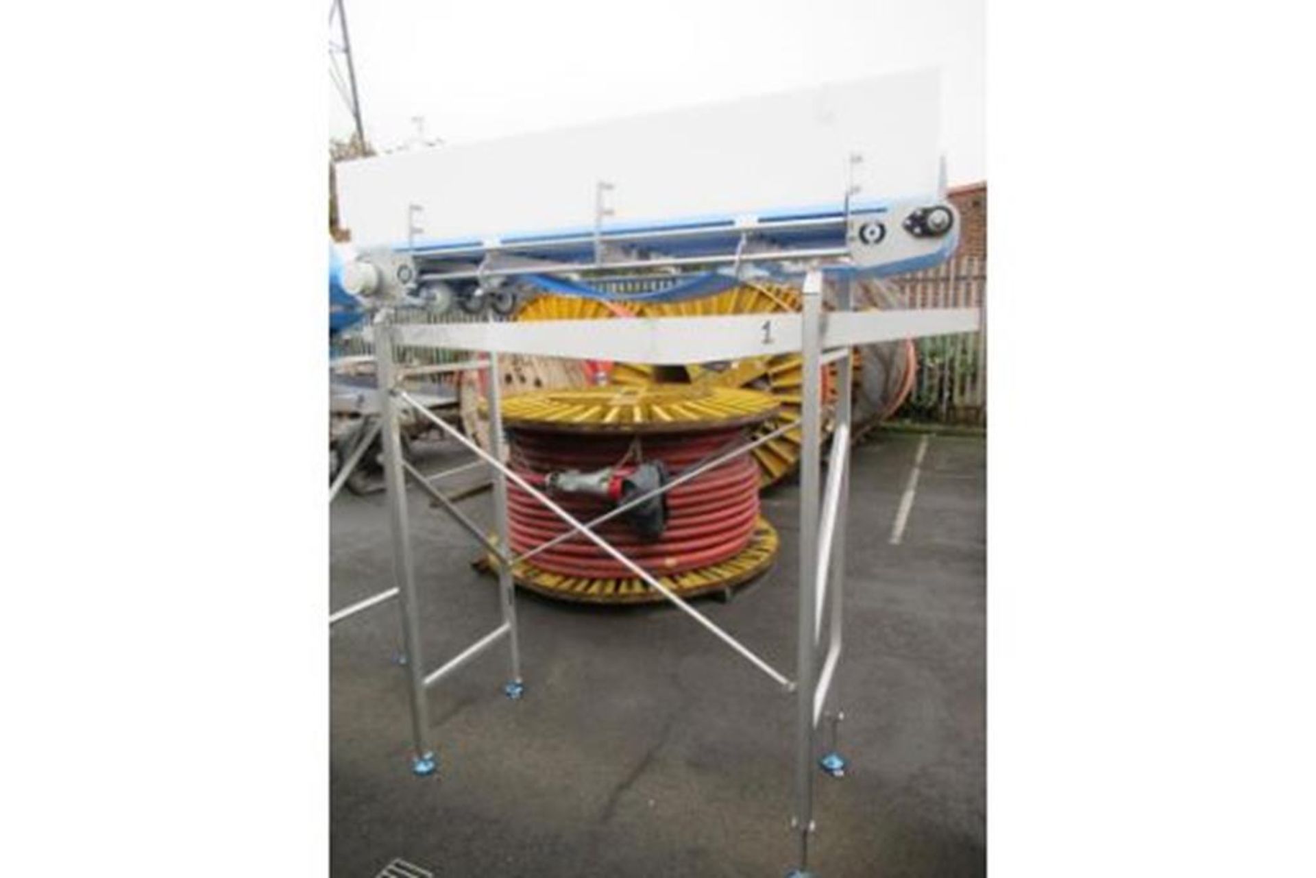 Stainless Steel Raised Interoll Conveyor System- guarded height approx 1900 x 1920 x 600