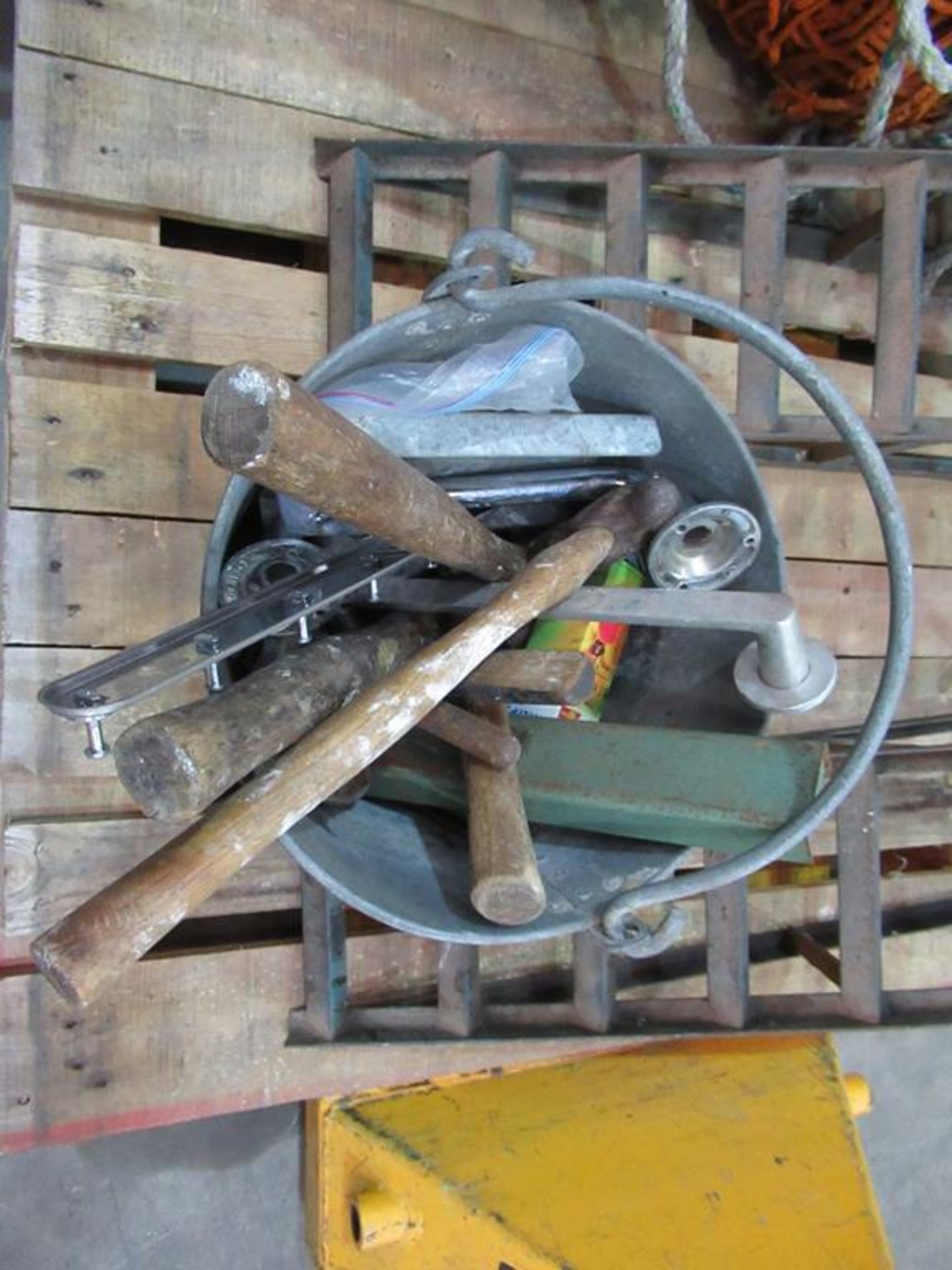 Pallet to contain bucket with various hand tools, two car ramps and goal netting - Image 2 of 3