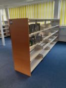 11 various sized metal framed library book shelves