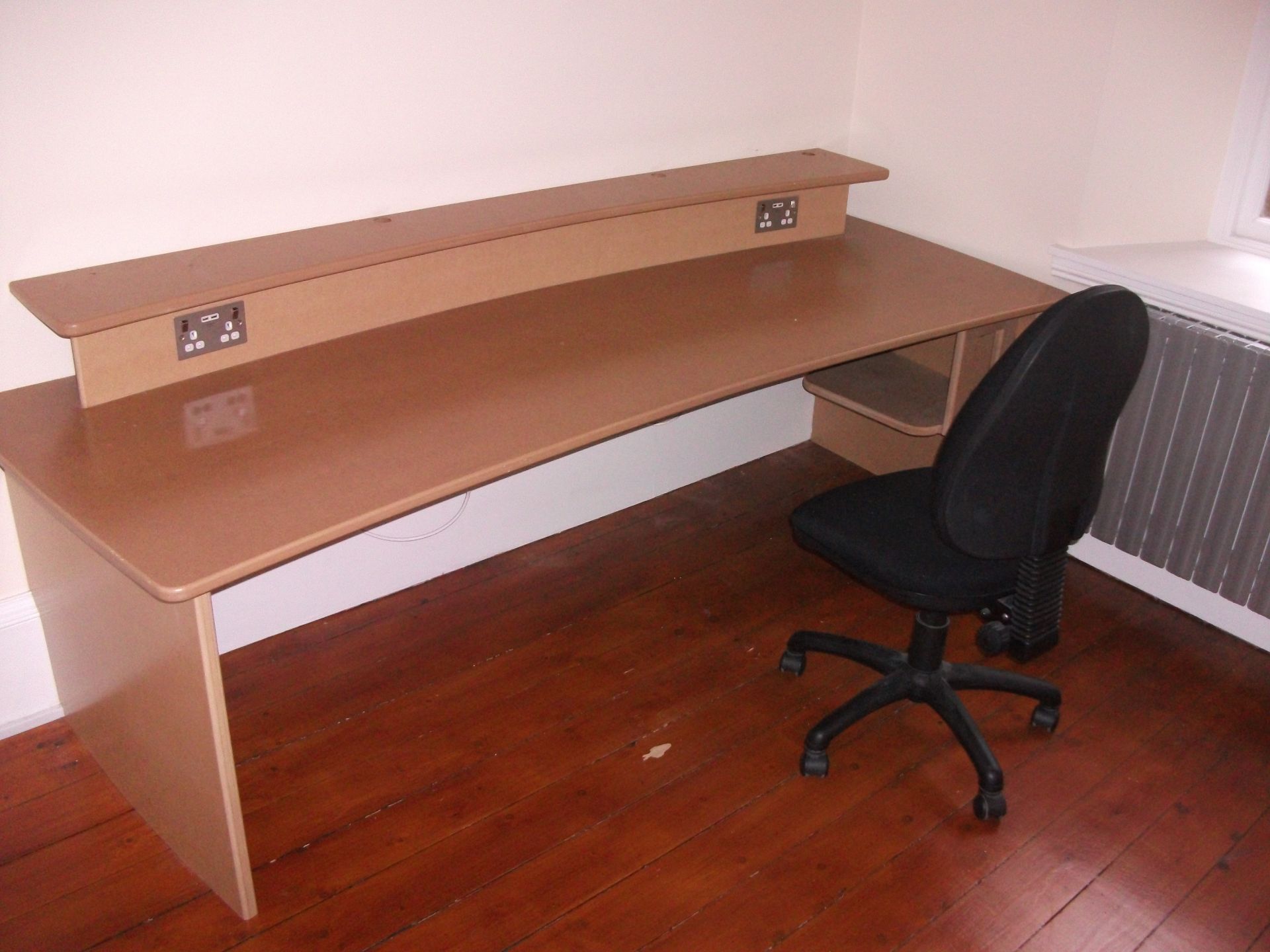 Light oak effect desk with electrical points and u