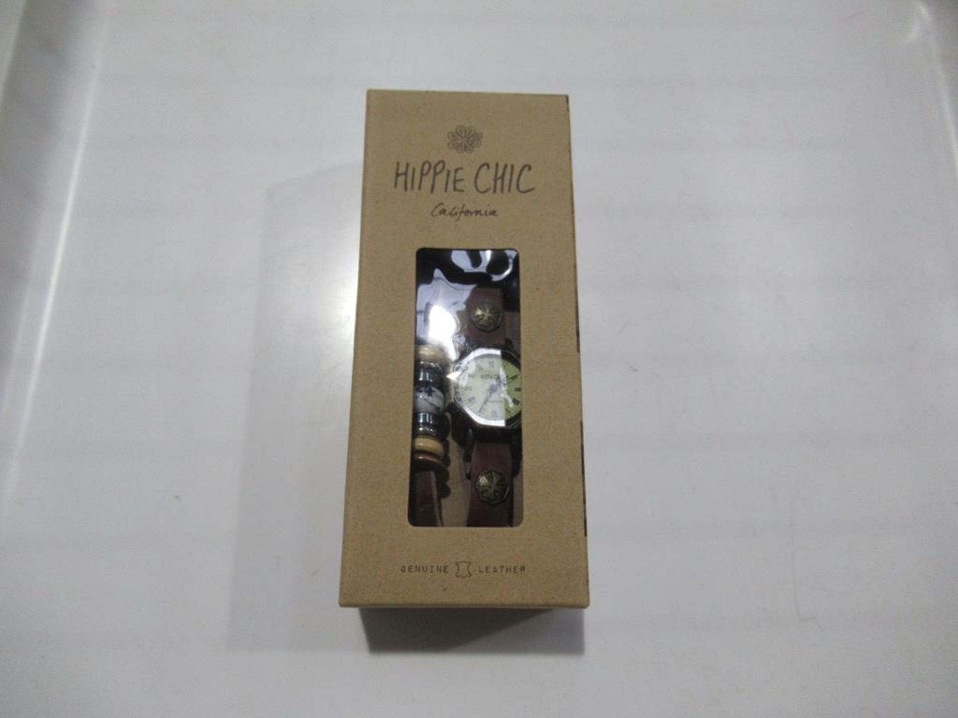 A box of Hippie Chic 'Indie Watch Tan' watches