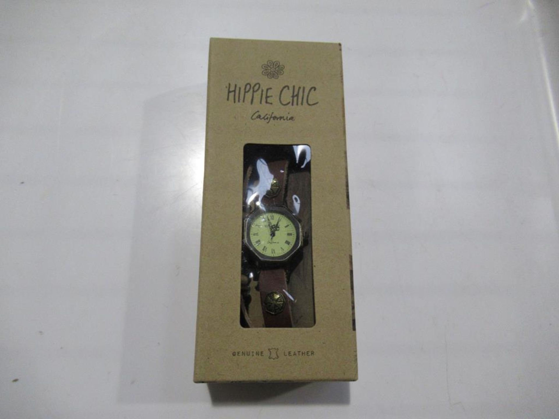 A box of Hippie Chic 'Indie Watch Tan' watches