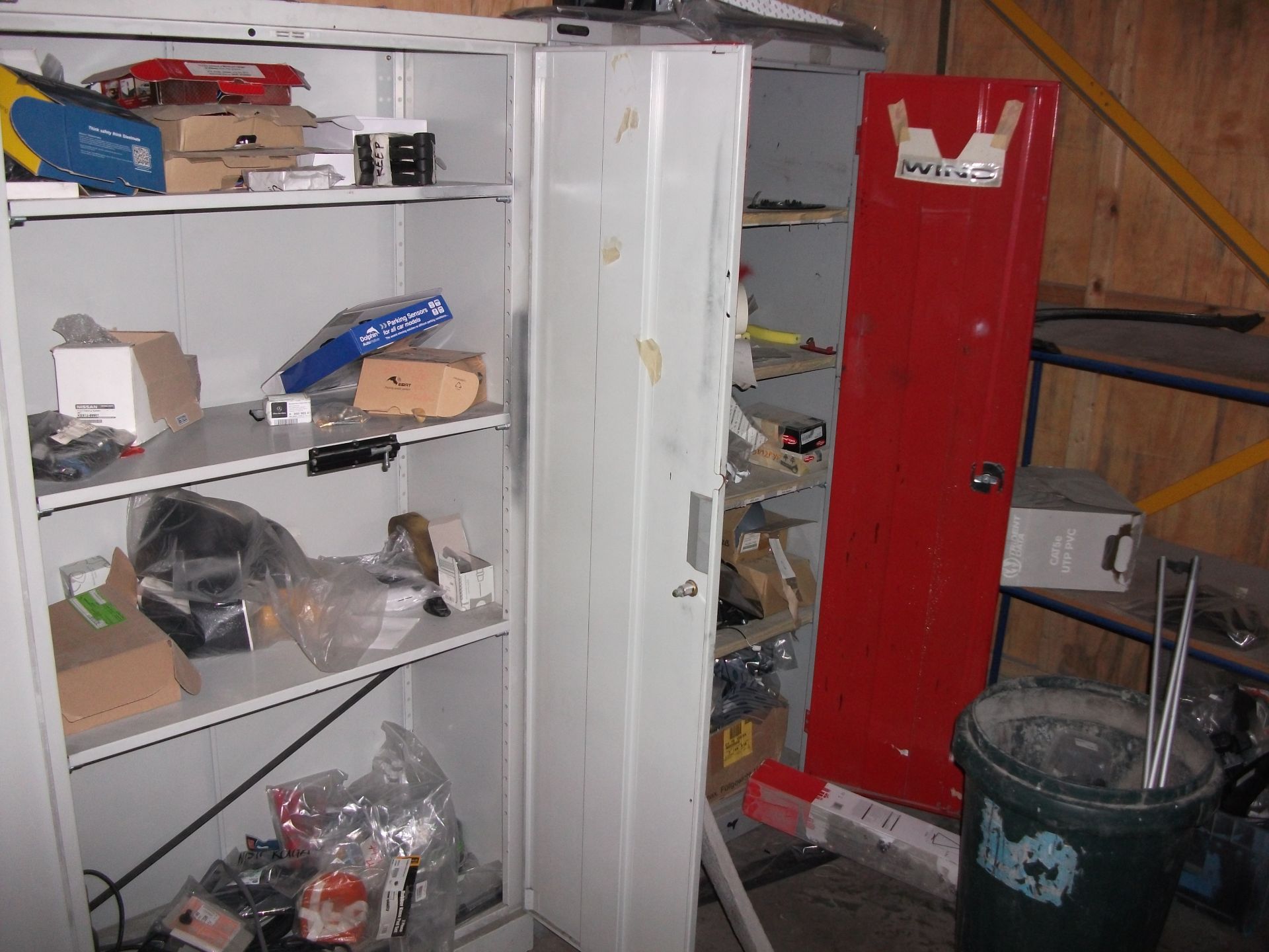 2 Steel storage cupboards and contents