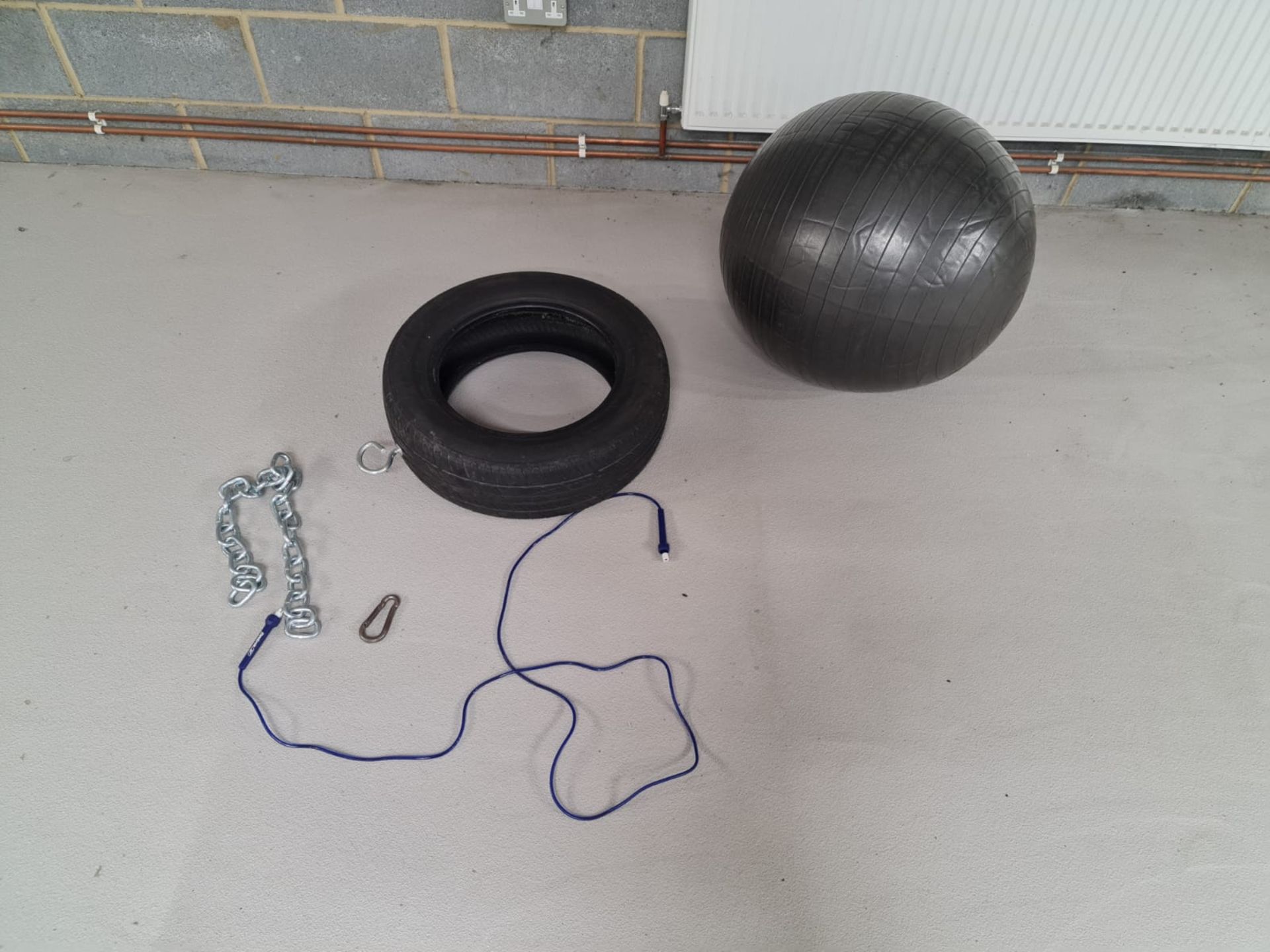 An Exercise Ball, Tyre and Skipping Rope