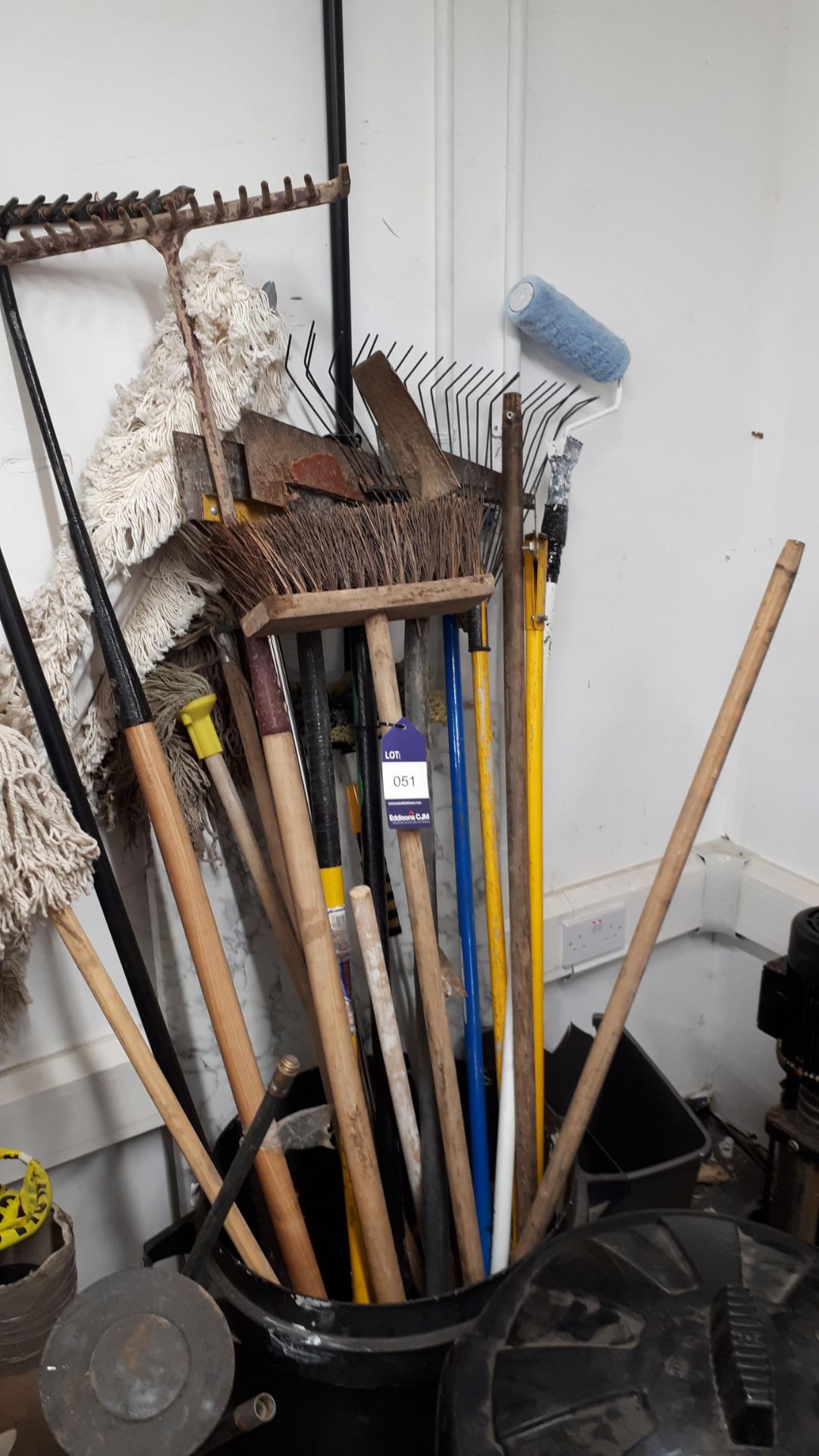 Large quantity of cleaning hand tools to bin, to include scrapers, mops etc