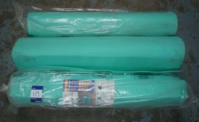 3 rolls of underlay material