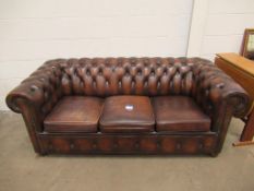 Brown leather Chesterfield three seater sofa