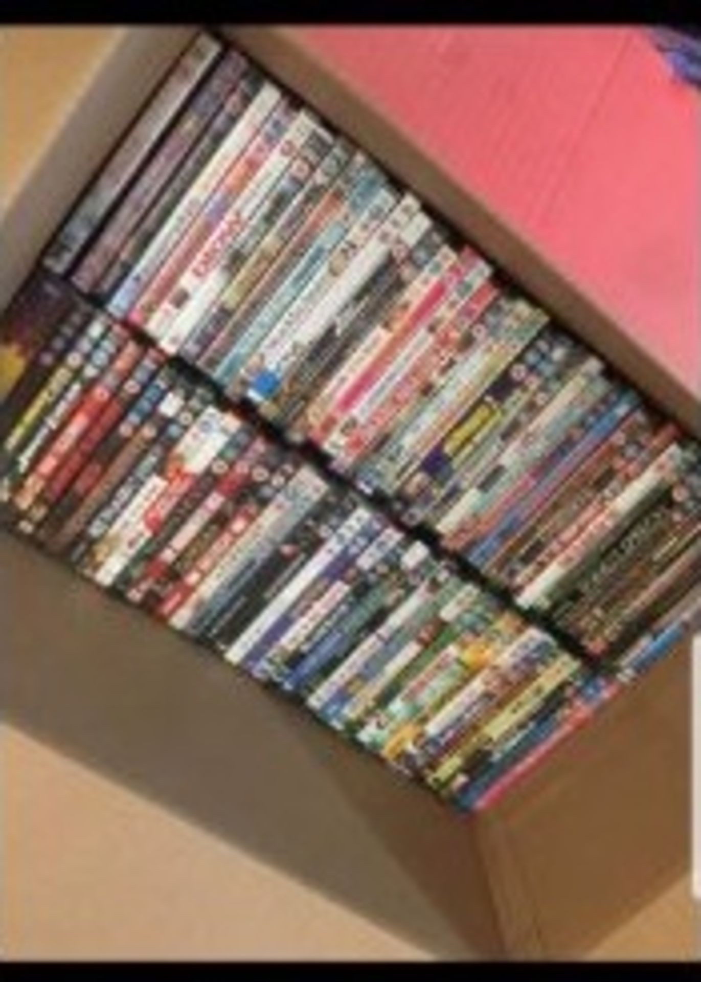 1000 New Packed and Sealed DVDs (various genres)