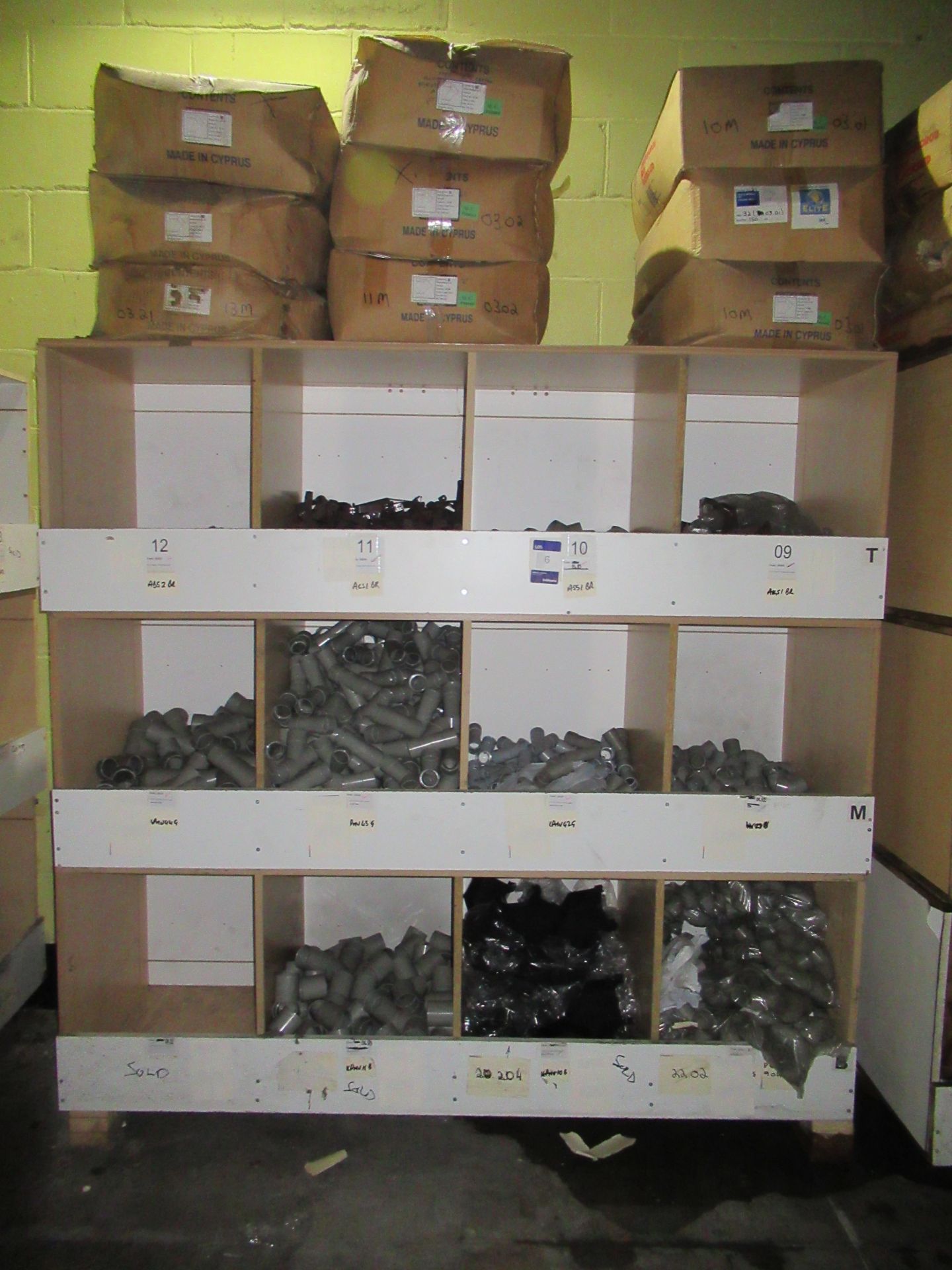 Contents to Wood Storage Unit to include Various Plastic Fittings and Clips, e.g. Square Pipe