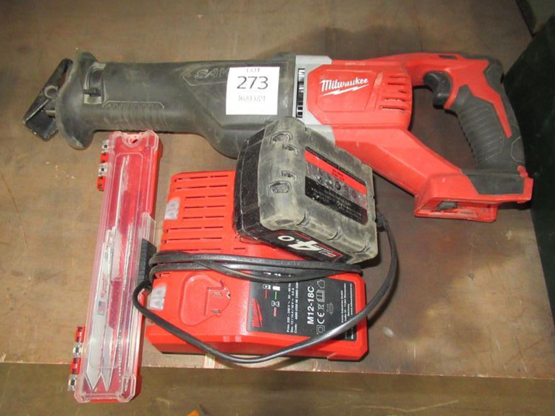 Milwaukee M18BSX cordless handsaw with battery and charger