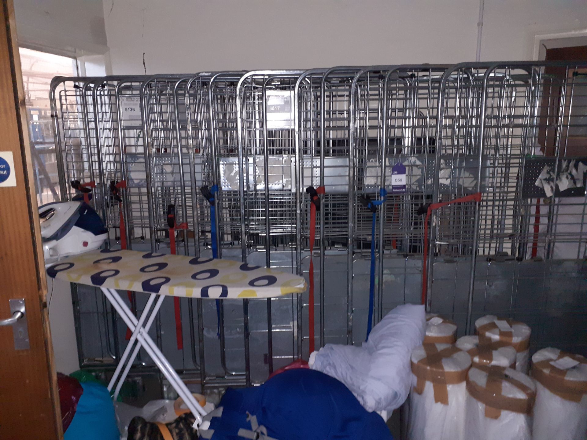 Eight Stacking Cage Trolleys