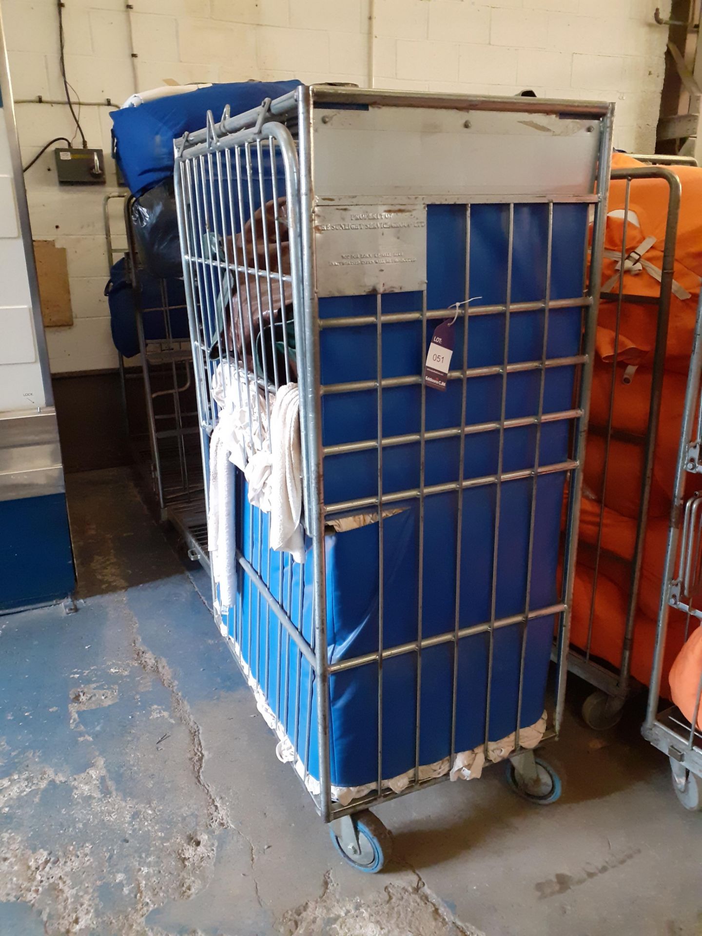 Three Steel Laundry Trolleys