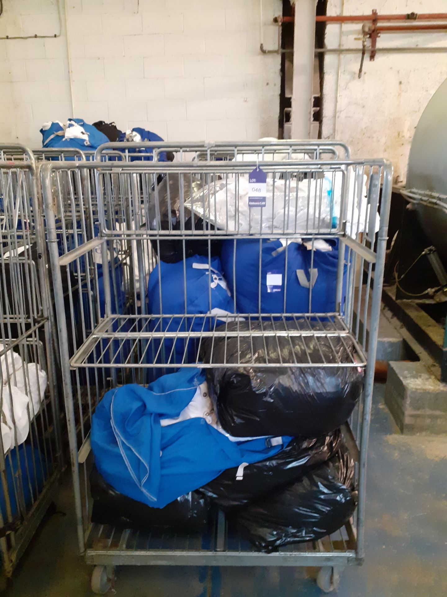 Six Steel Laundry Trolleys