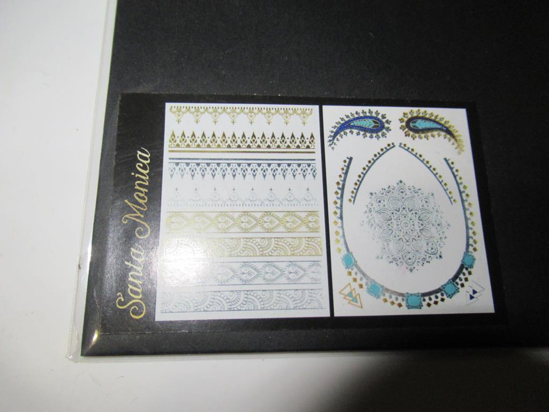 A box of LA Shimmer 'flash tatoos' - Image 2 of 3