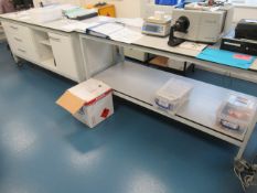 Various Office Furniture to the lab to include two mobile work benches, filing cabinet, shelving uni