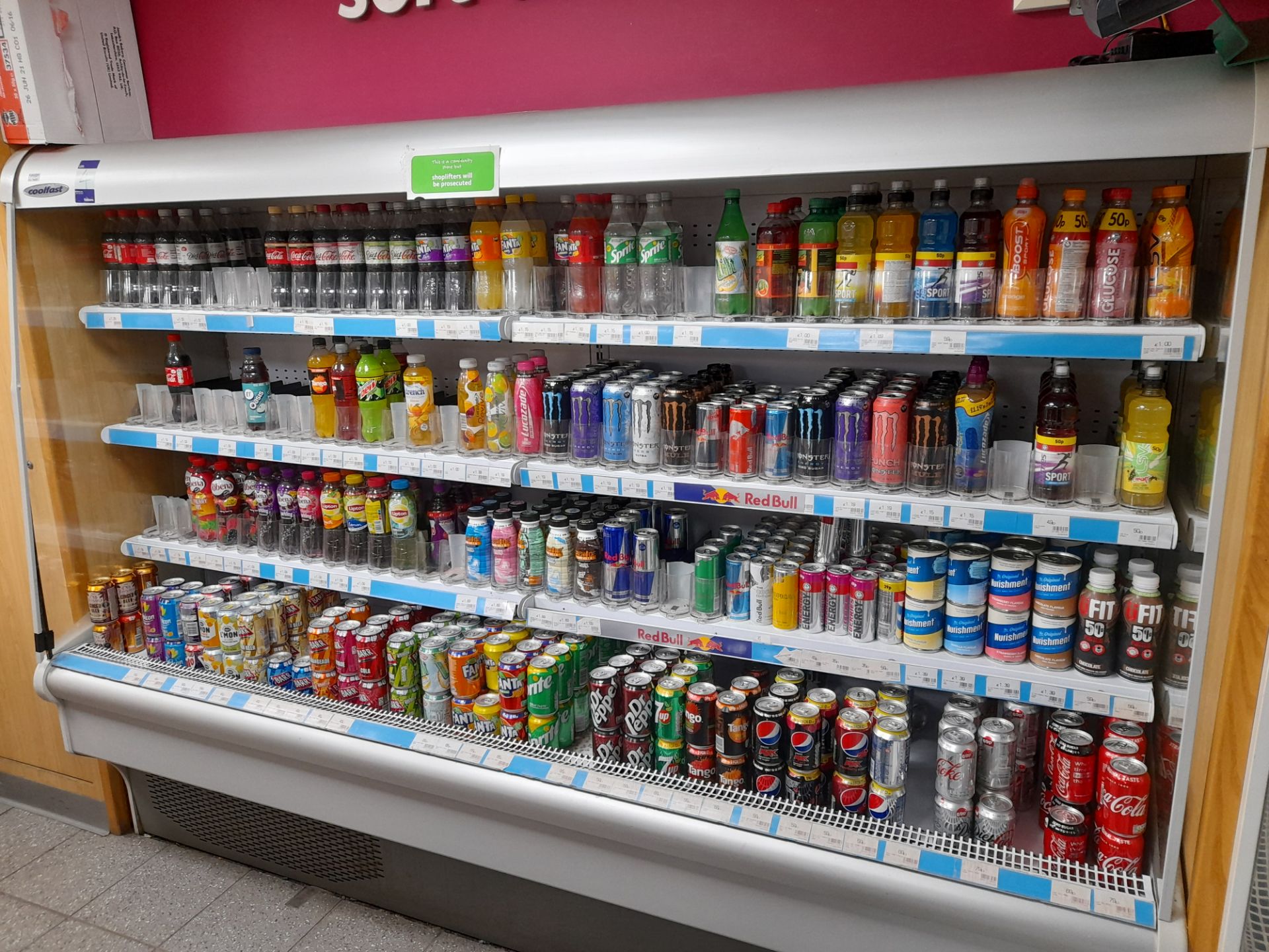 Large quantity of assorted soft drinks stock (cans and bottles) to 2 x refrigerators, and 3 x bays