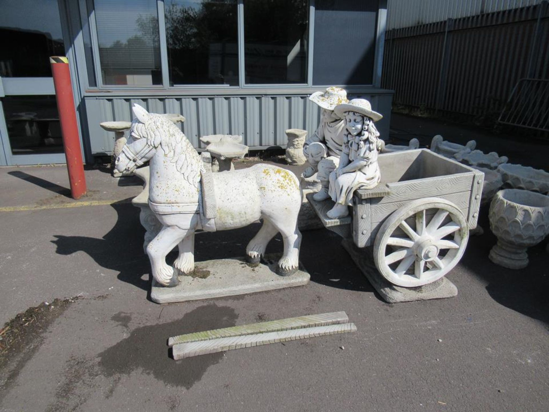 Border stone horse and cart garden ornament