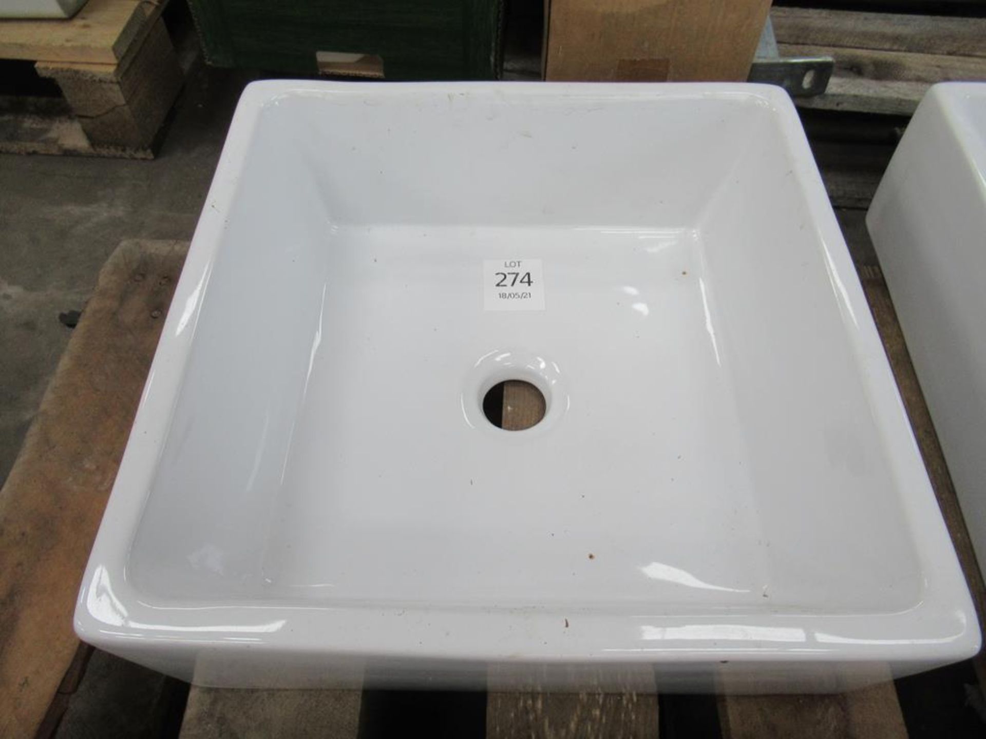 A square Porcelain Sink/Bowl