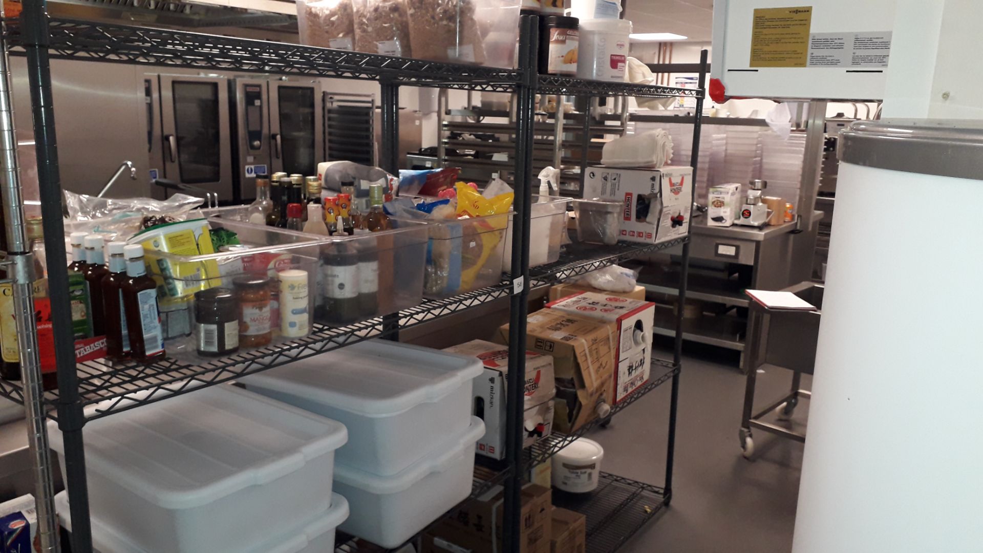 Two steel wire adjustable Shelving Units with contents of food stuffs