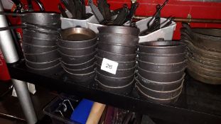 Contents of trolley to include Utopia cast iron Skillets