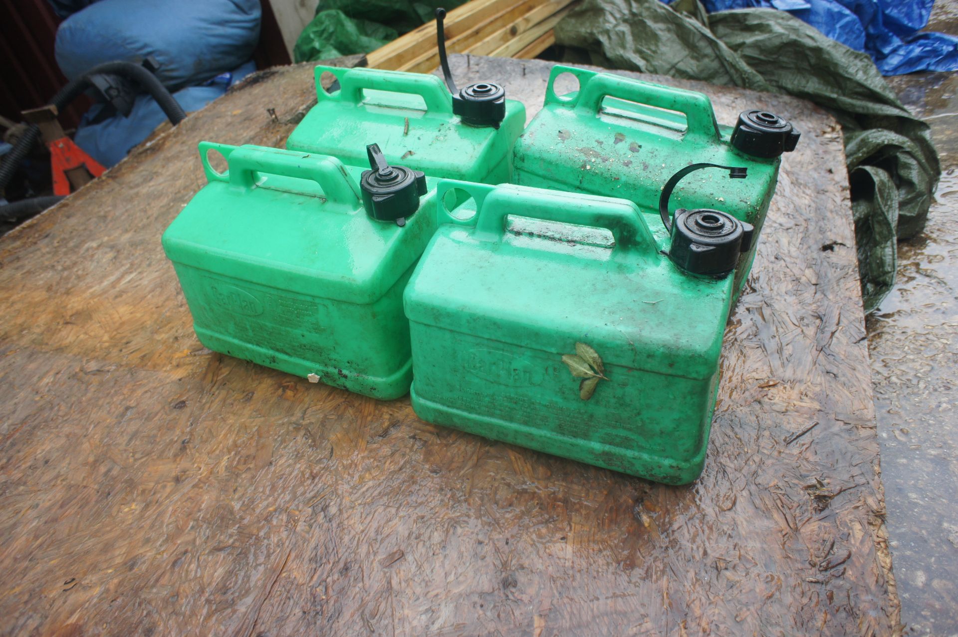 4 x Unleaded plastic Petrol Cans