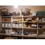 Large quantity of assorted crockery to shelving