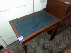 Mahogany veneer chest of drawers and a writing table, tooled leather insert top