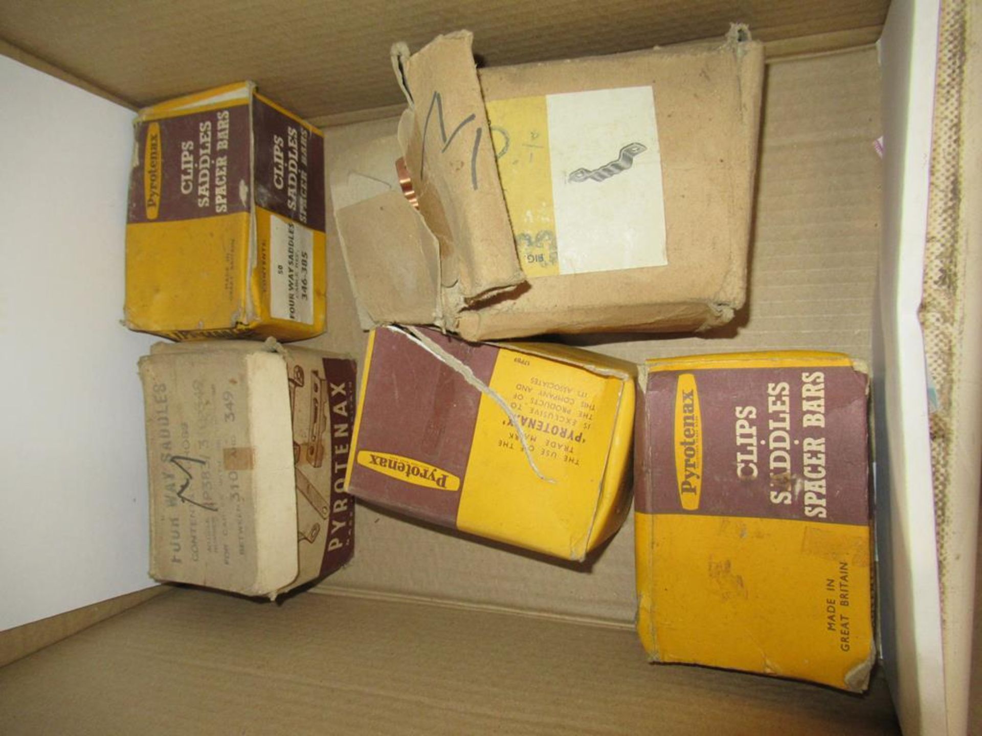 5 boxes of various Copper Saddles