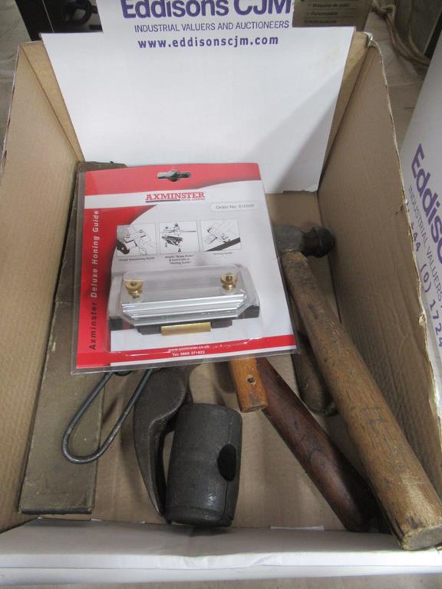 Various Tools in box to include Hammers, Square, Chisel Sharpener etc