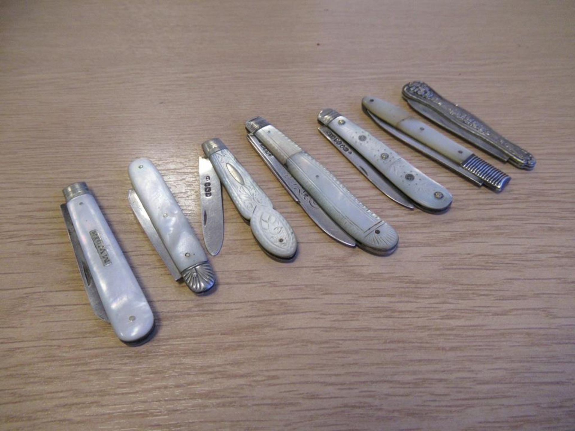 Seven Georgian and Later Hallmarked Silver/Mother of Pearl Fruit Knives
