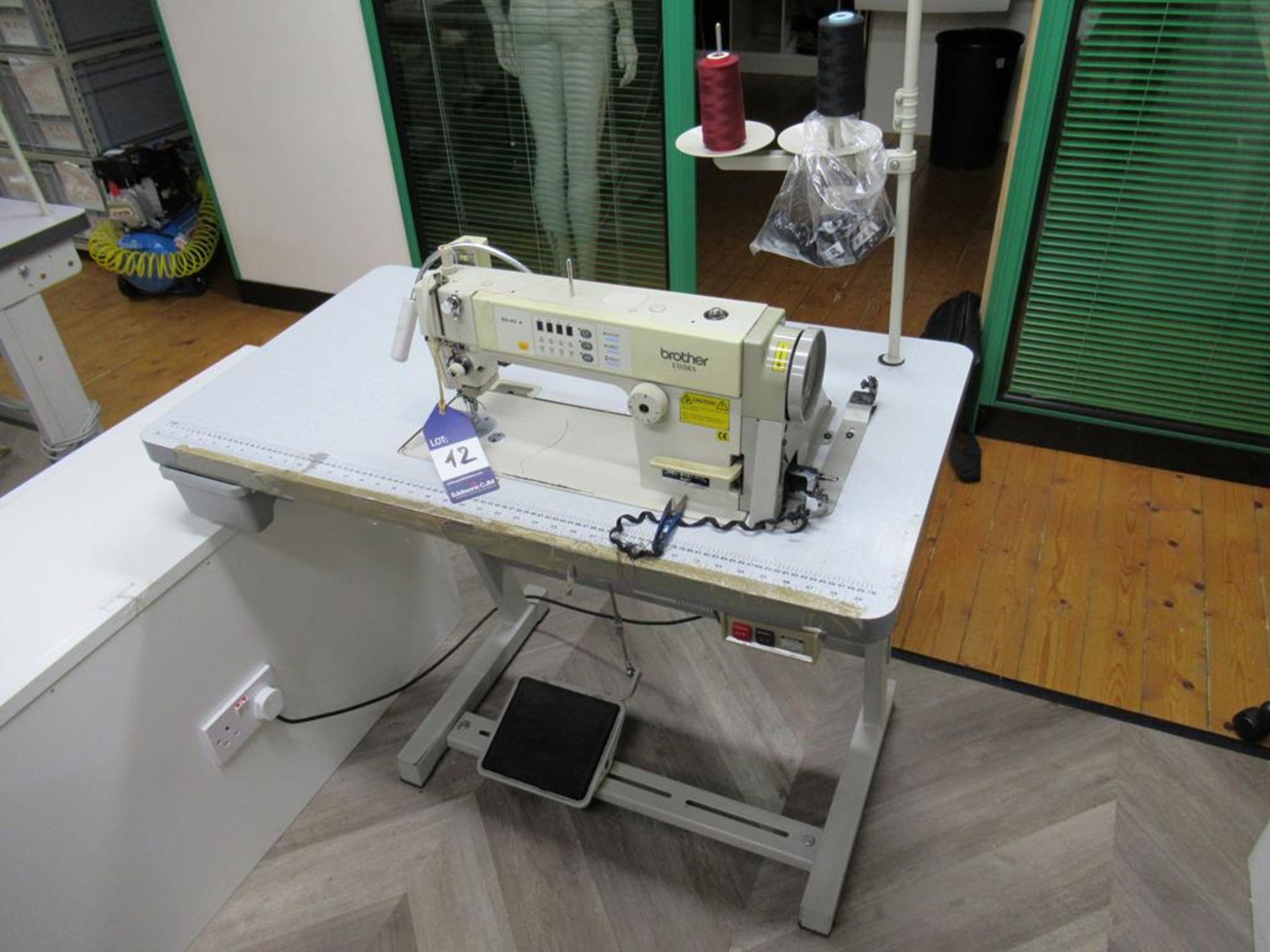 A Brother DBZ-B737-413 Single Needle Straight Stitcher complete with Table