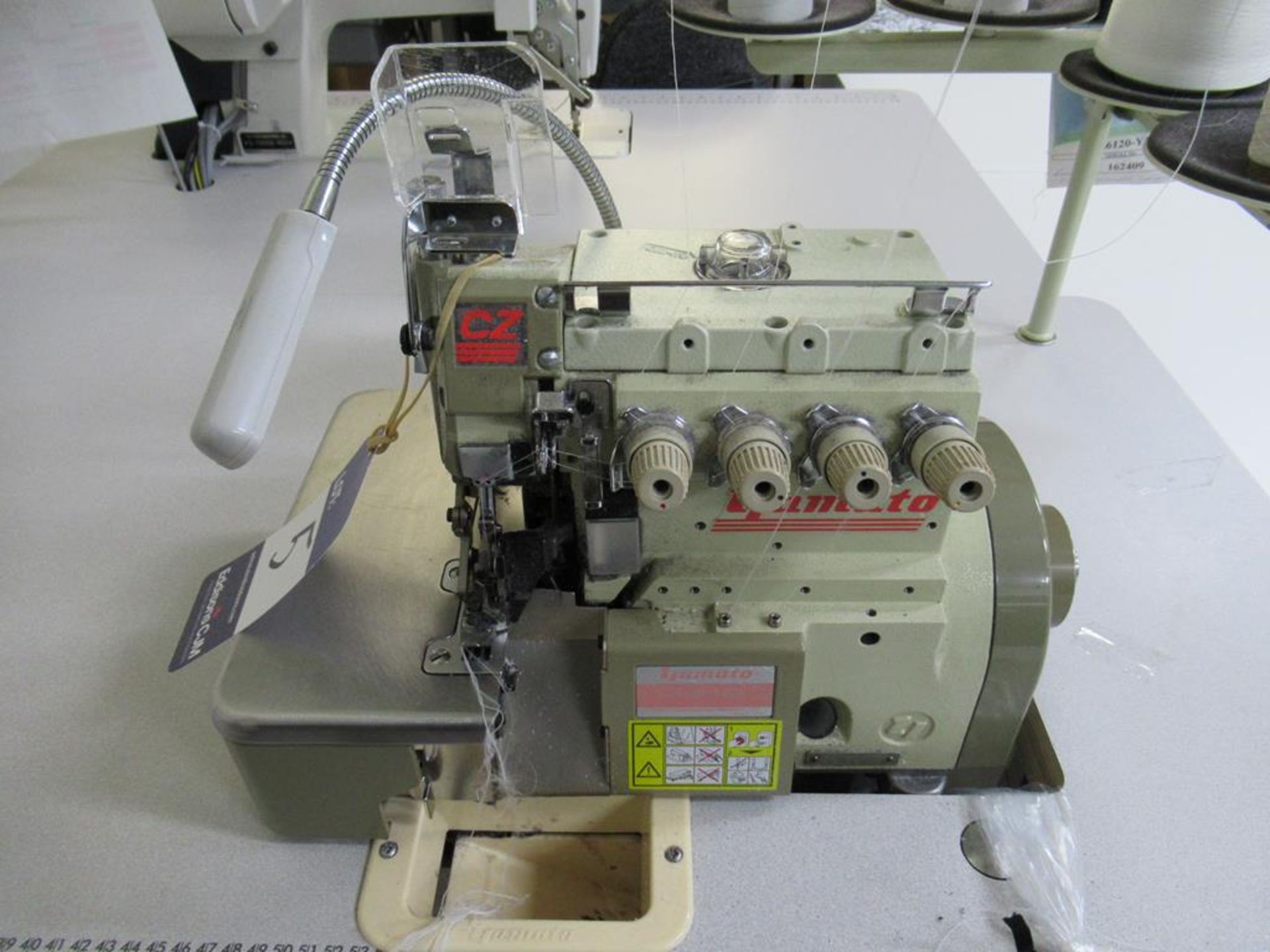 A Yamato CZ6120- Y6DF Needle 4 Thread Overlock Industrial Sewing Machine Complete with Table - Image 2 of 5