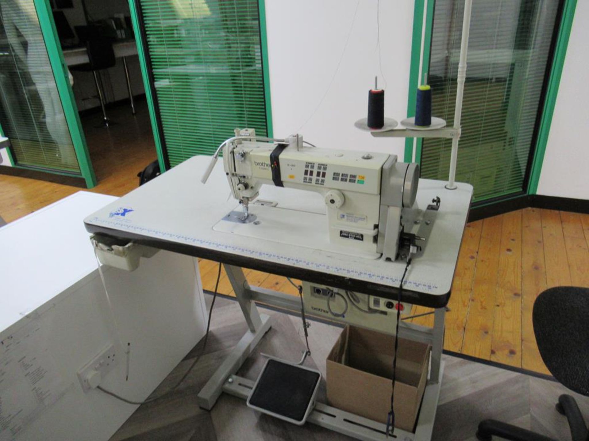 A Brother Exedra DB2-B737-413 Single Needle Straight Stitcher Complete with Table