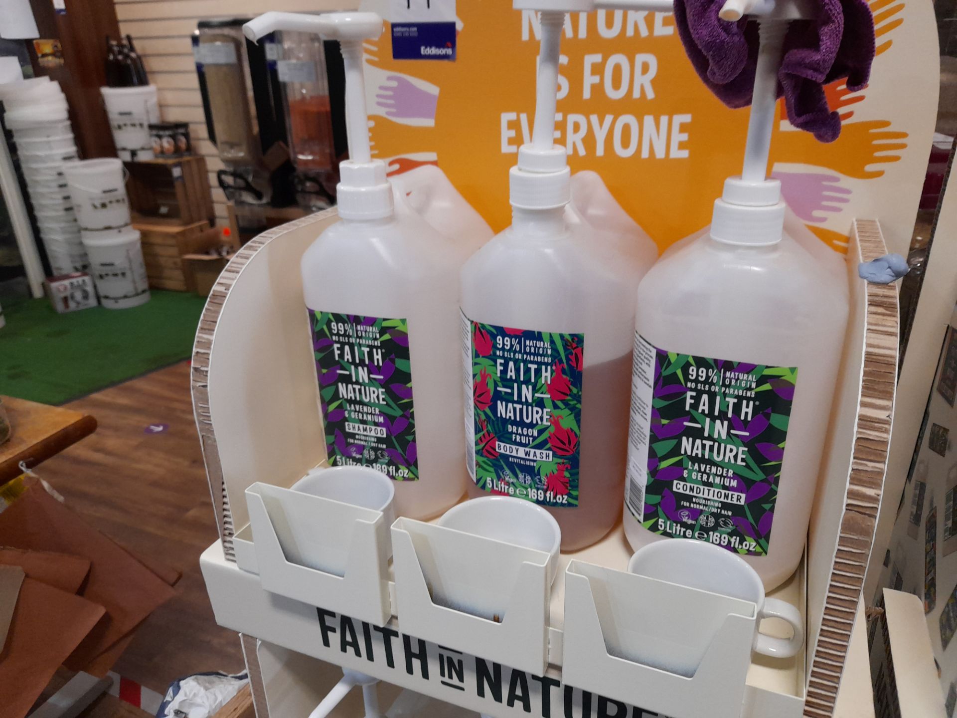 2x Faith in Nature Display Stands with 19x part opened Faith in Nature shampoos, conditioners, - Image 3 of 7