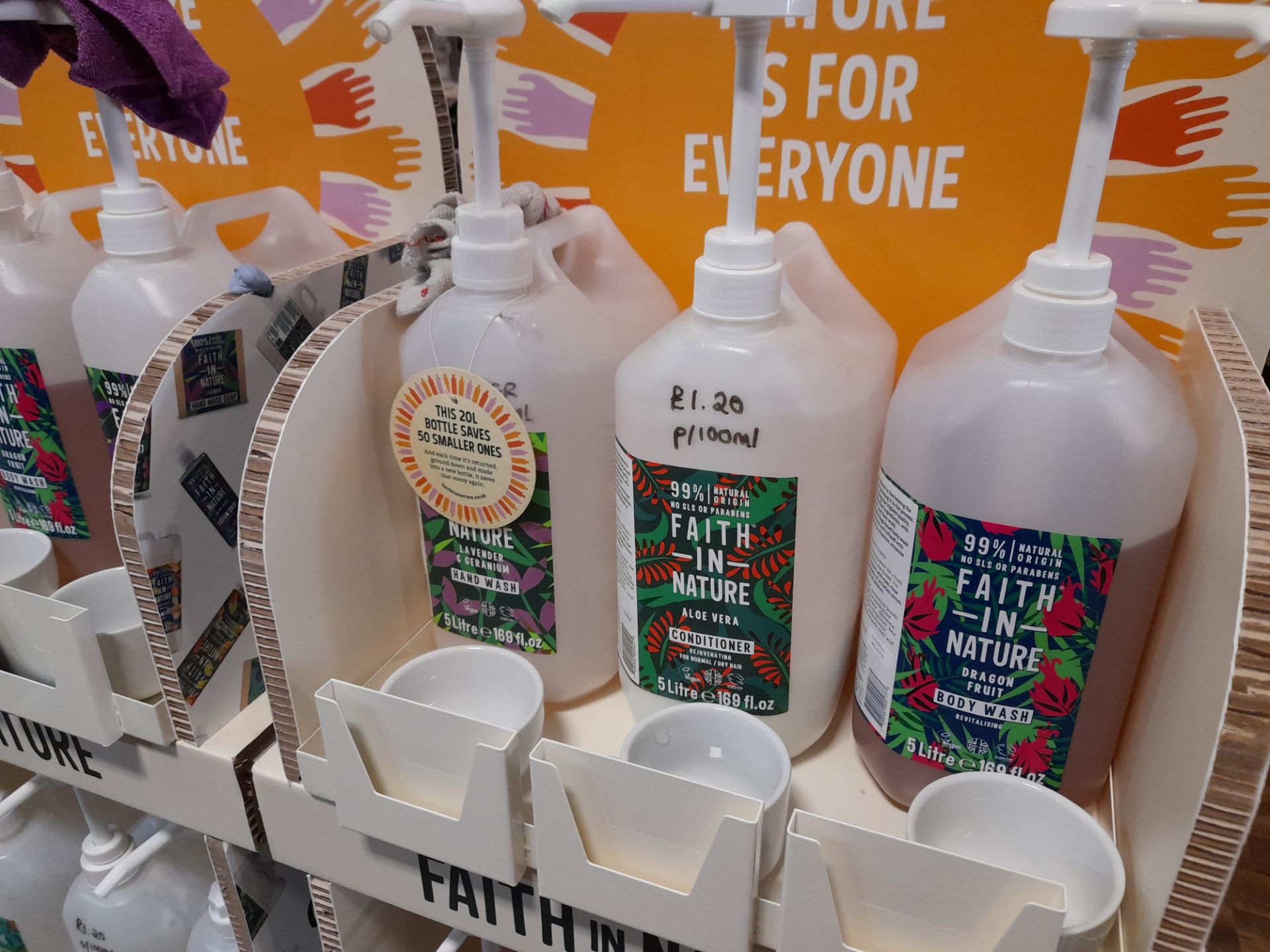 2x Faith in Nature Display Stands with 19x part opened Faith in Nature shampoos, conditioners, - Image 2 of 7