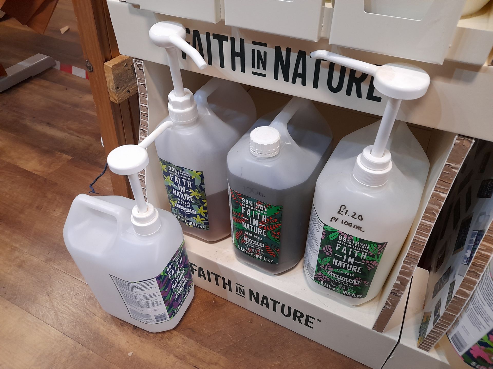 2x Faith in Nature Display Stands with 19x part opened Faith in Nature shampoos, conditioners, - Image 5 of 7